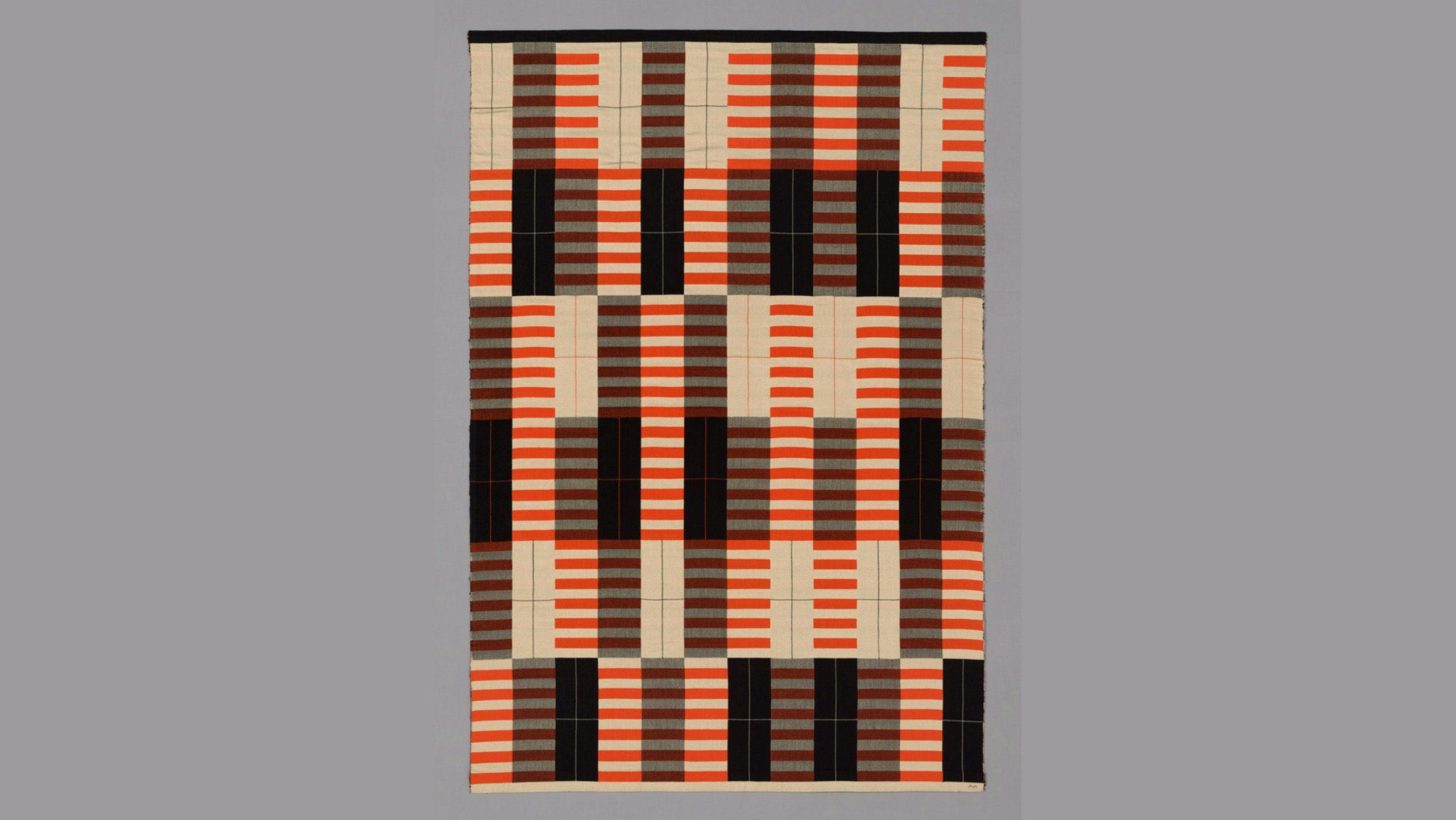 A work by Anni Albers, titled "Black-White-Red," designed 1926/1927, woven 1965.